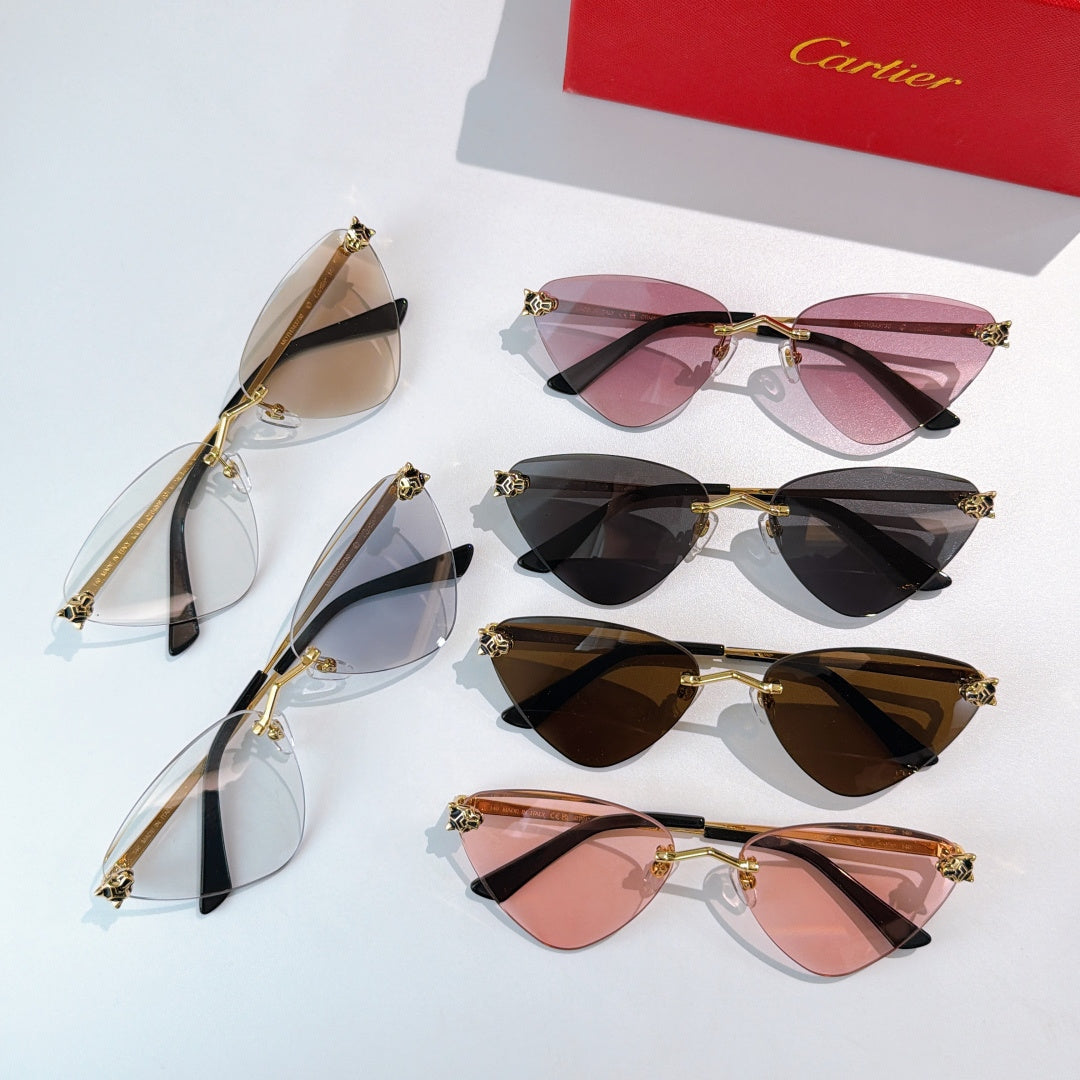 Assorted cat-eye glasses set with gold-tone frames and colored tinted lenses