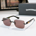 Gold-tone round sunglasses with brown-lavender gradient lenses and black temples