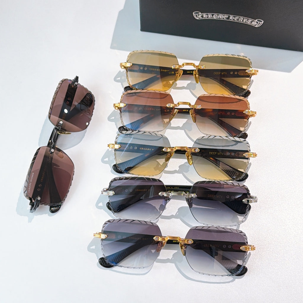 Stacked sunglasses assortment with gold frames and multicolor tinted lenses