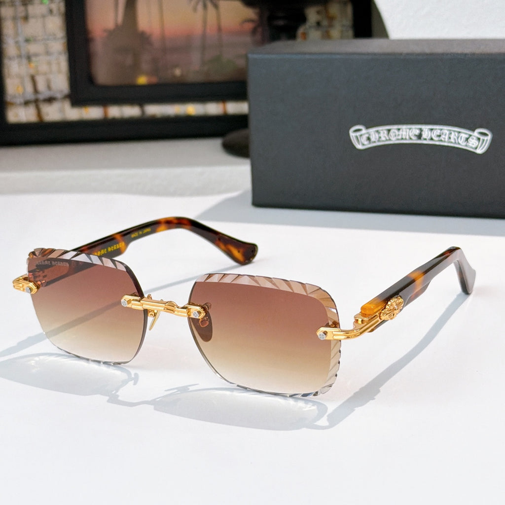 Gold-tone round sunglasses with warm amber lenses and tortoise-patterned temples