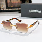 Gold-tone round sunglasses with warm amber lenses and tortoise-patterned temples