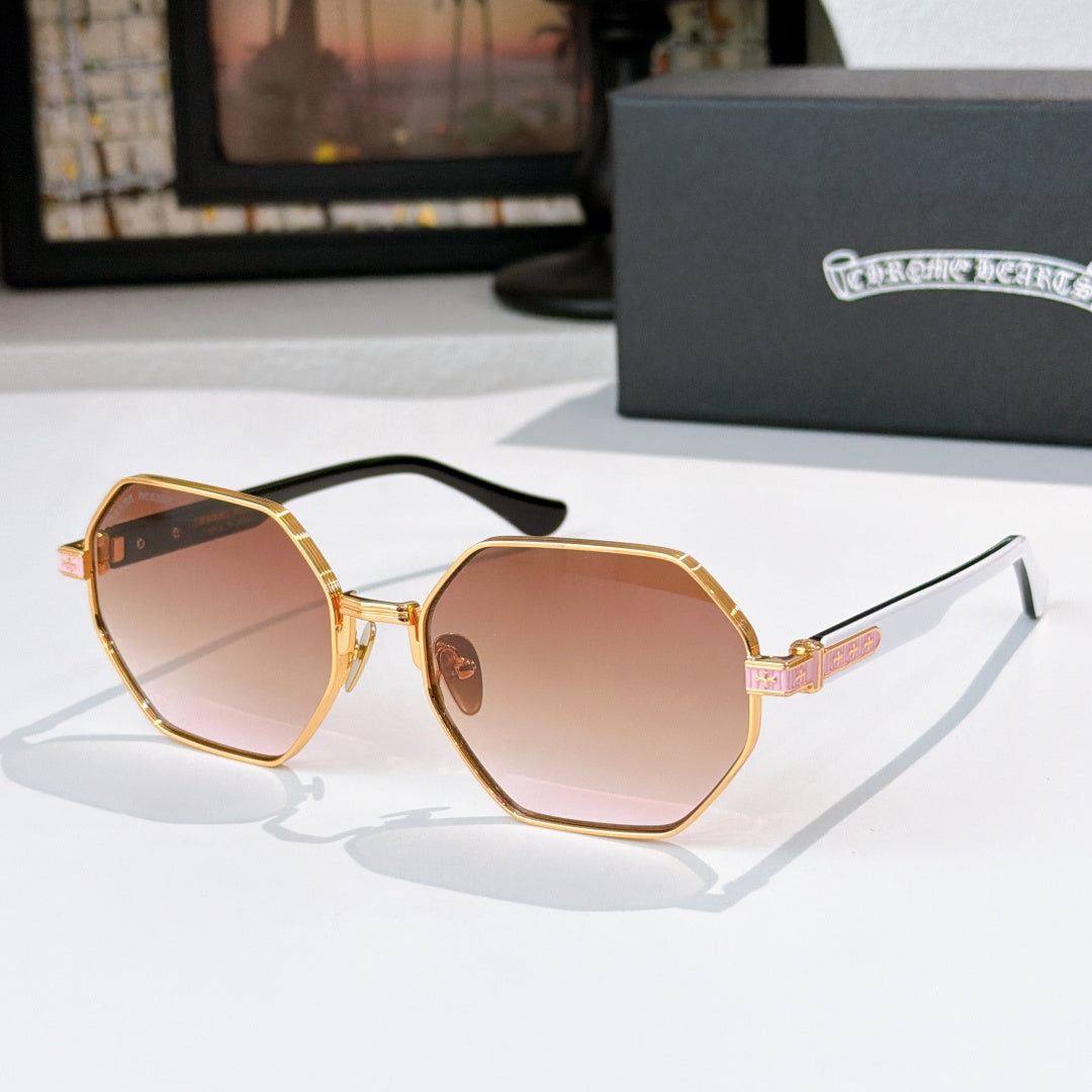 Octagonal sunglasses with gold frame and rose-tinted lenses, with patterned temple detail