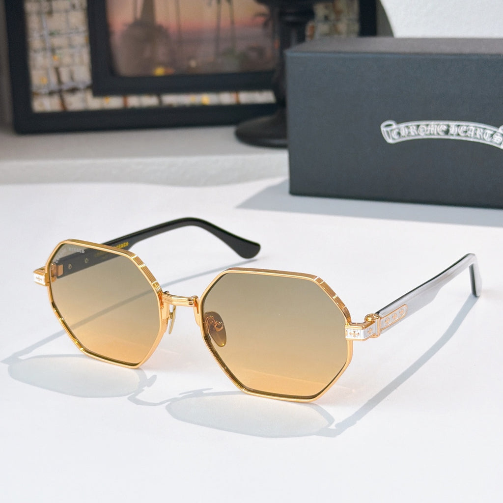 Octagonal sunglasses with gold frame, amber-tinted lenses, and black temples