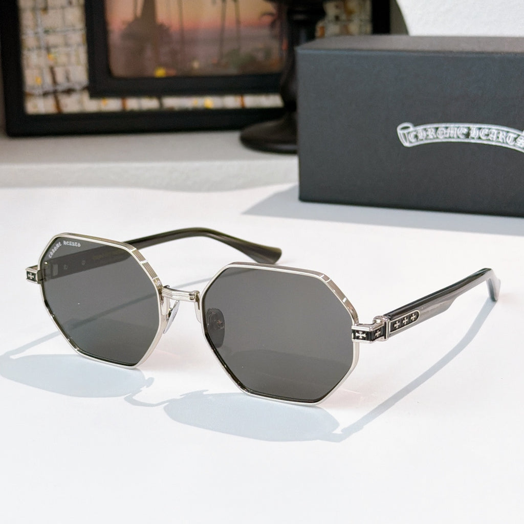 Octagonal sunglasses with silver frame, dark-tinted lenses, and black temple tips