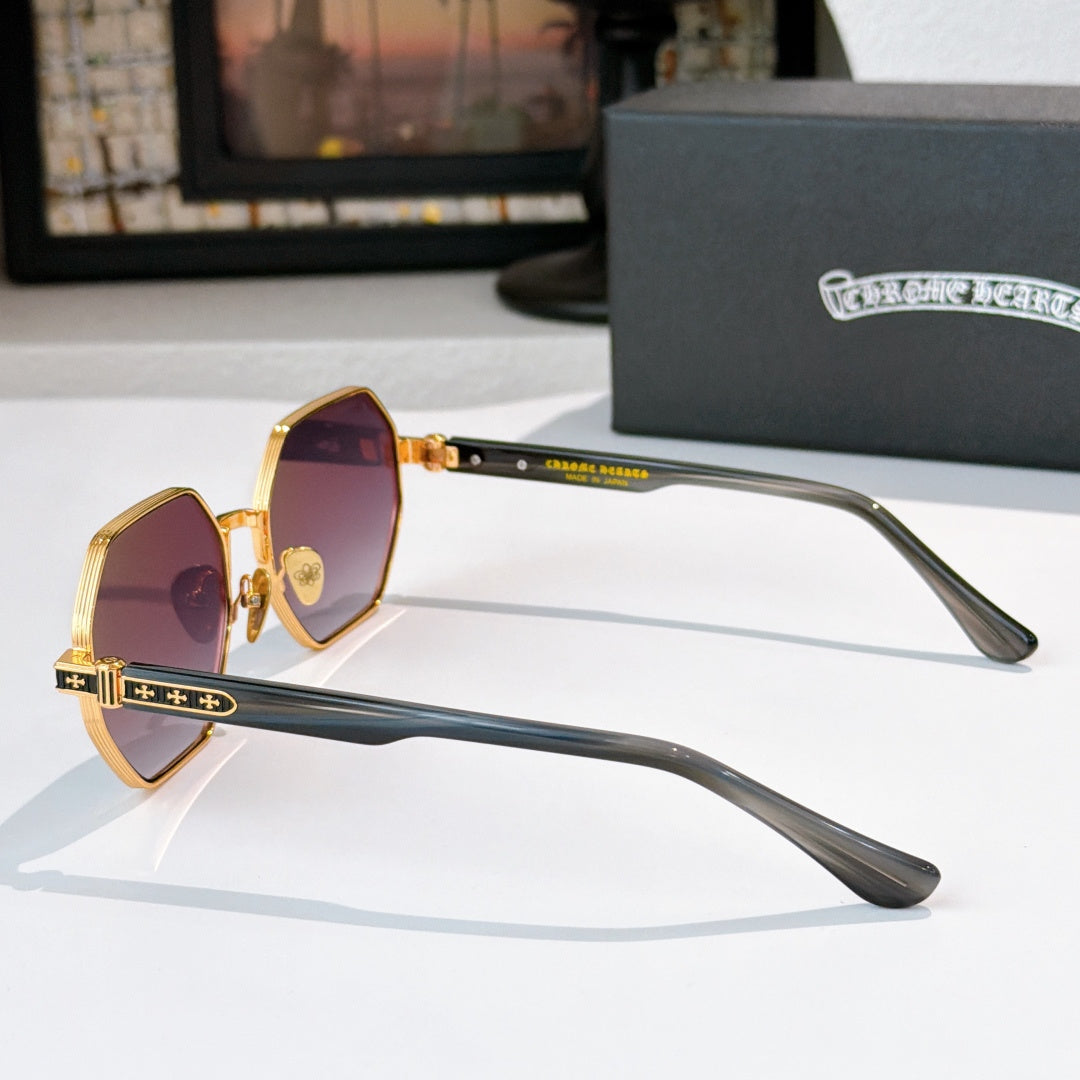 Octagonal sunglasses in gold with purple-tinted lenses and long, clear temple arms