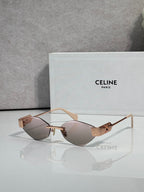 Celine sunglasses with light rose-tinted lenses and tan frame, gold-tone hardware.