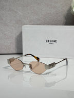 Celine sunglasses with brown-tinted lenses, tan frame, and gold-tone temples.
