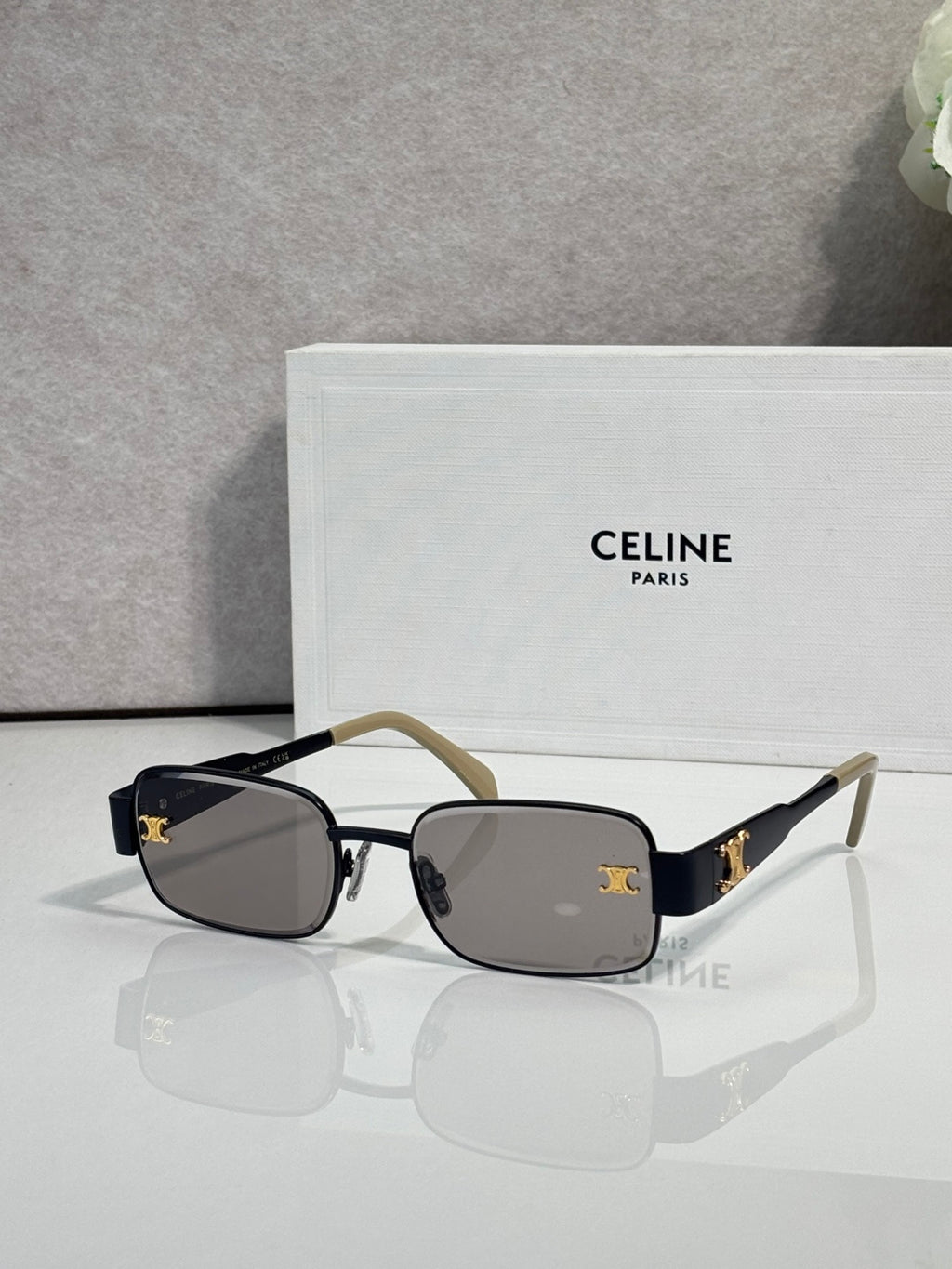 Gold-tone rectangular sunglasses, dark smoke lenses, tortoiseshell temple arms