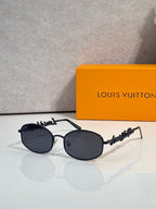Louis Vuitton sunglasses with dark frames and dark lenses, rounded shape and logo temple