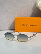 Louis Vuitton round glasses with silver frame and blue-gray tinted lenses
