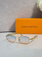 Louis Vuitton round glasses with gold frame and pale pink-tinted lenses