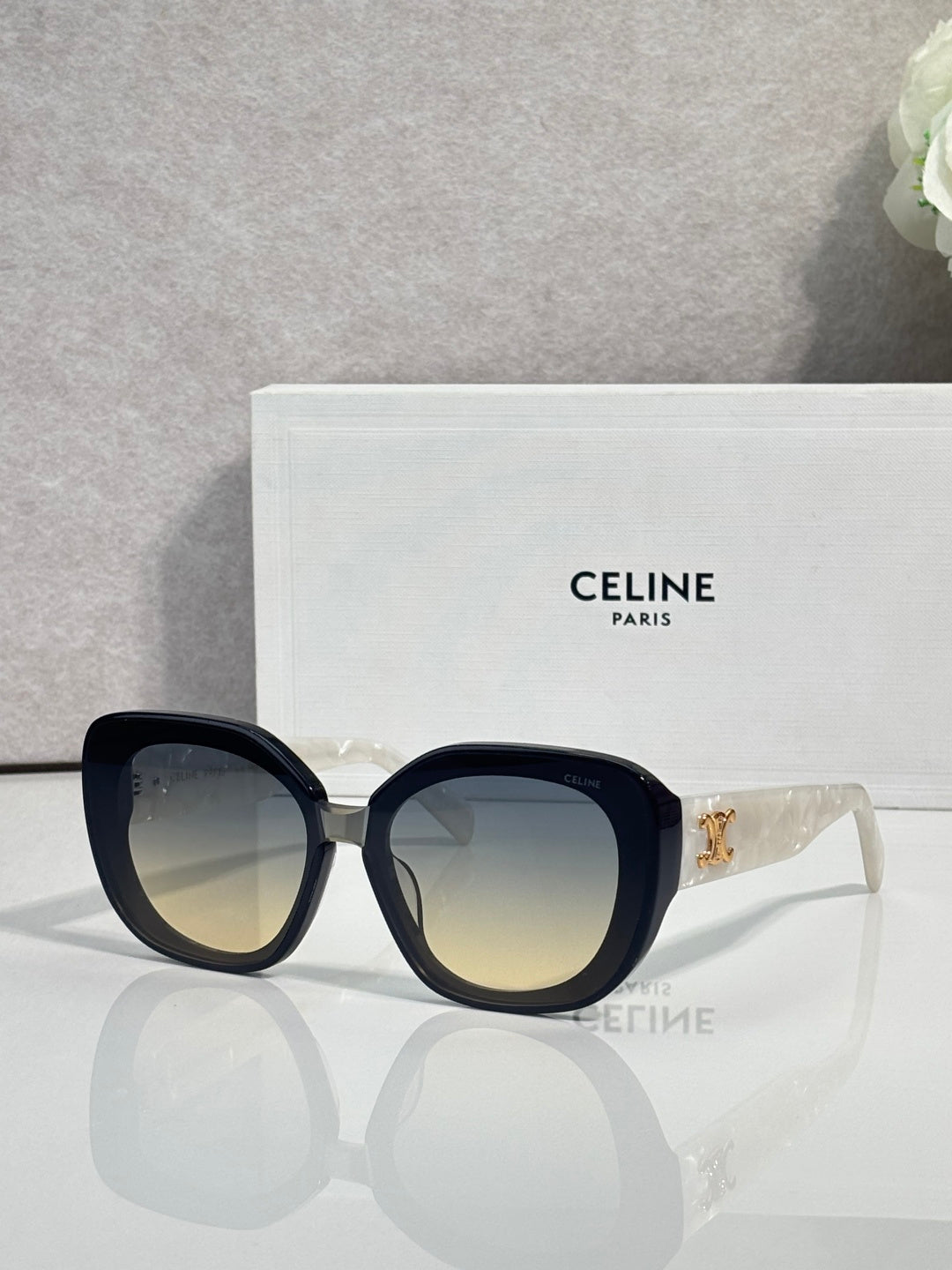 Celine wide cat-eye sunglasses, black frames with gradient tinted lenses