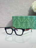 Gucci glasses, black square frame, red and green temple accents, clear lenses
