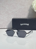 Hexagon sunglasses with dark navy lenses and black frame, gold accents on temples