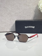 Hexagon sunglasses with dark lenses, brown frame, and red temples with gold hardware