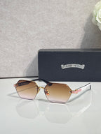 Hexagon sunglasses with gradient brown lenses and rose-gold metal frame, gold details