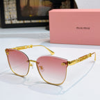 MiuMiu sunglasses with gold frames and pink tinted lenses, cat-eye style