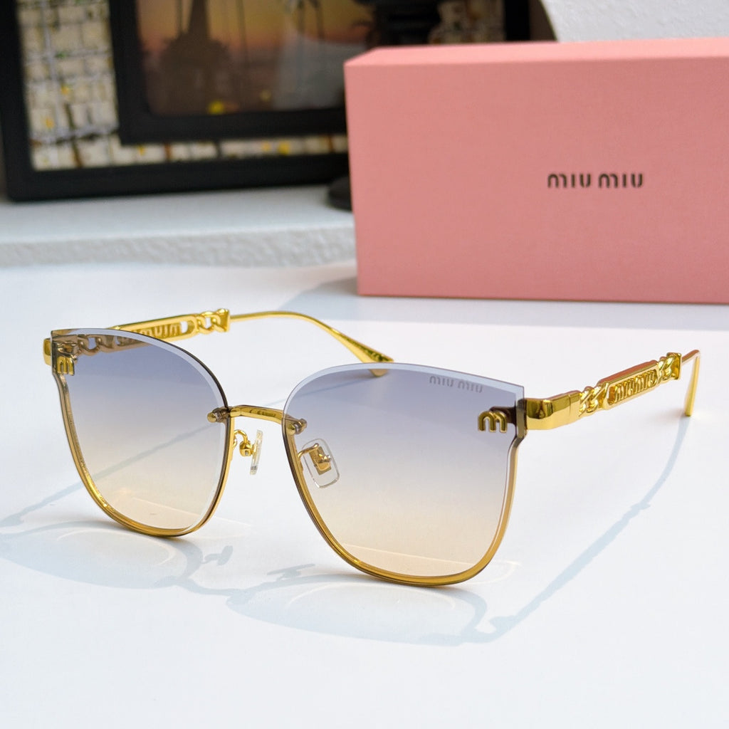 MiuMiu sunglasses with gold frames and light blue tinted lenses, cat-eye style