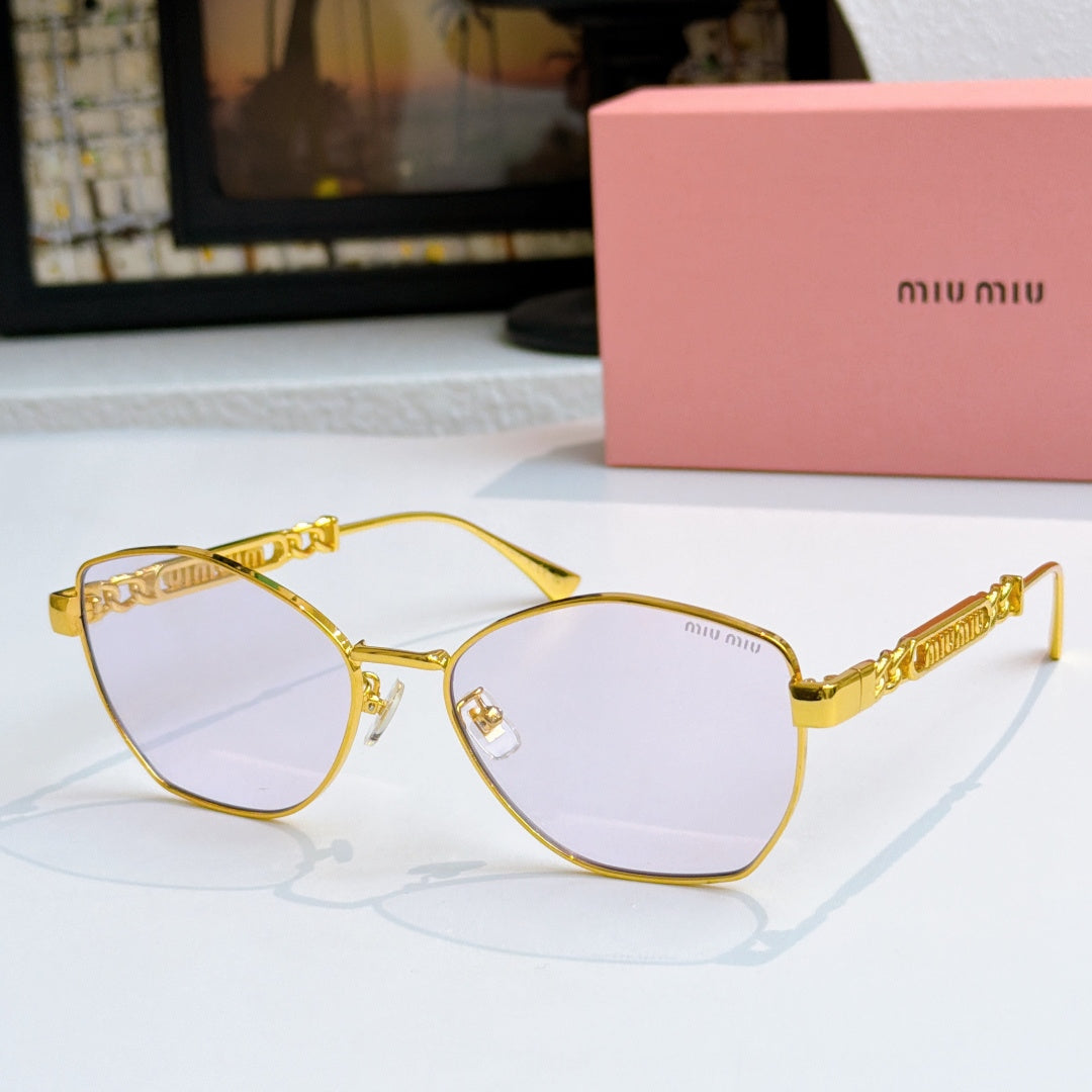MiuMiu glasses with gold-tone cat-eye frames and tinted lenses