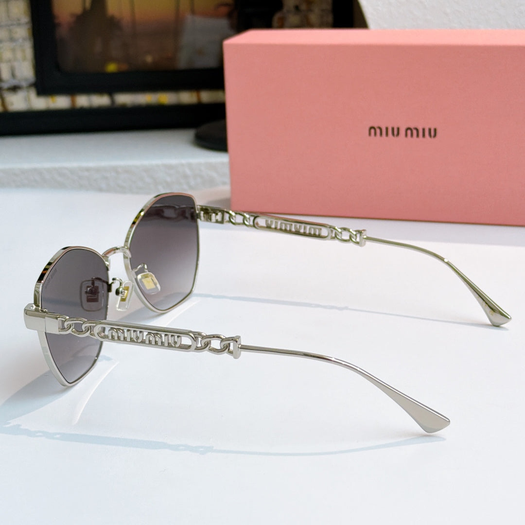 MiuMiu glasses with silver-tone cat-eye frames and chain-detail temples