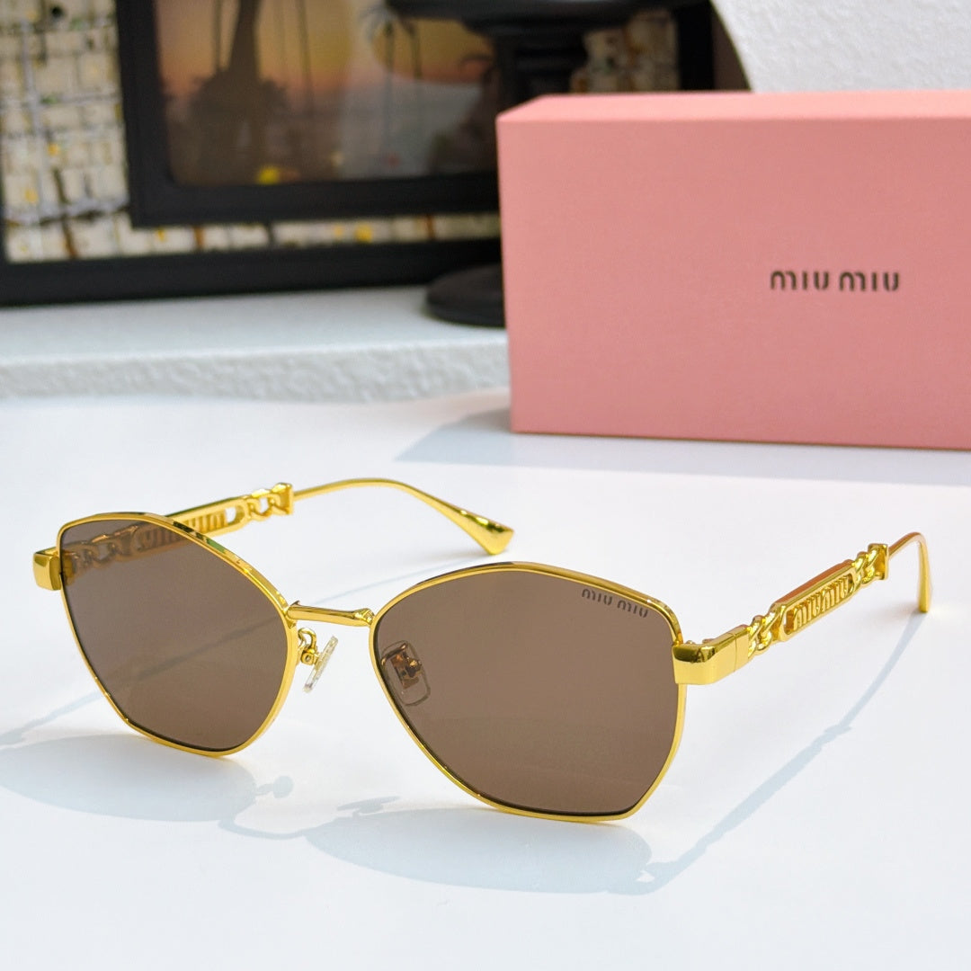 MiuMiu glasses with gold-tone cat-eye frames and dark brown tinted lenses