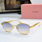 MiuMiu glasses with gold-tone cat-eye frames and light blue tinted lenses