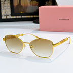 MiuMiu glasses with gold-tone cat-eye frames and gradient brown tinted lenses