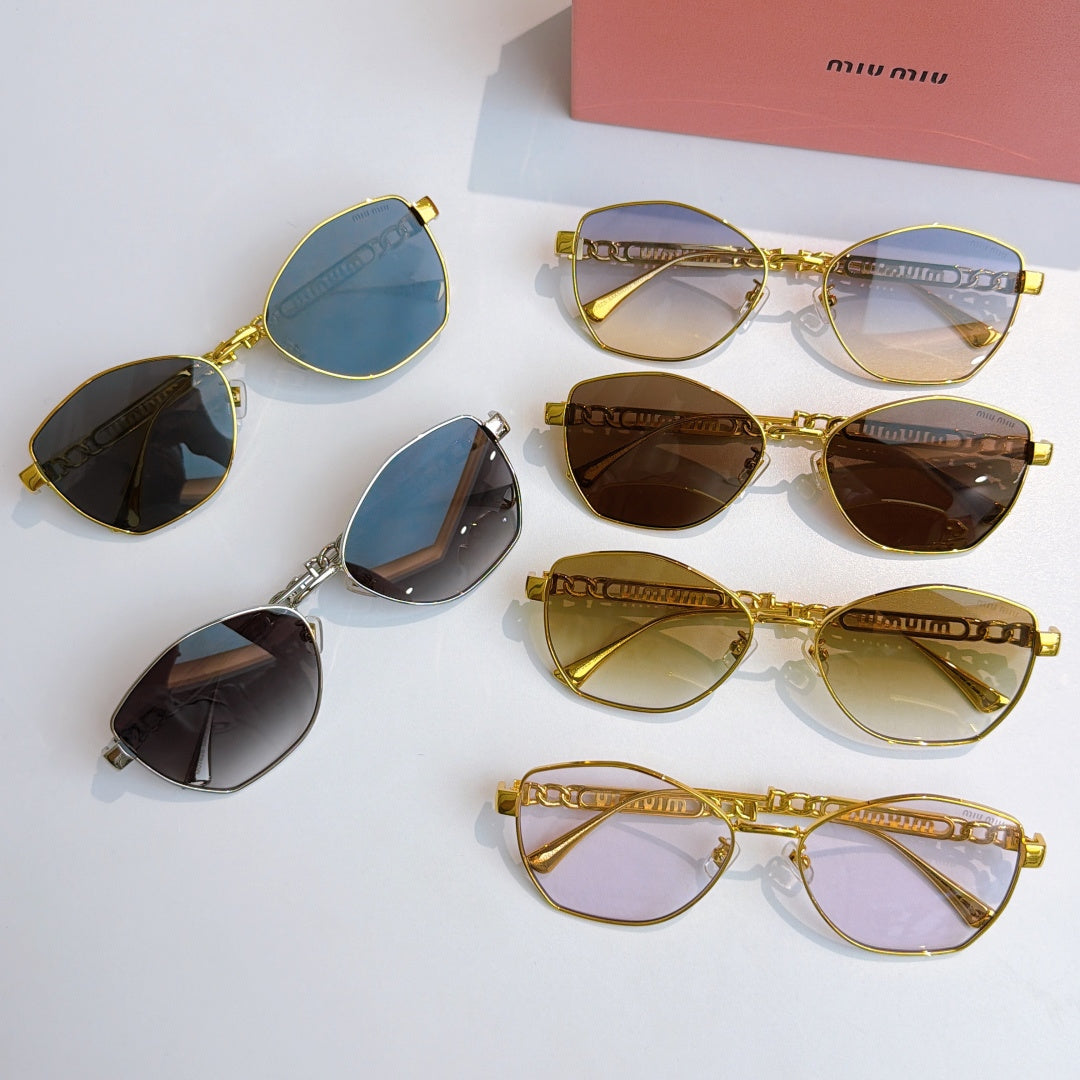 Assorted MiuMiu glasses with gold and silver cat-eye frames and tinted lenses
