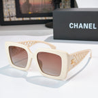 Square sunglasses with cream frame and rose-tinted lenses, lattice temple details