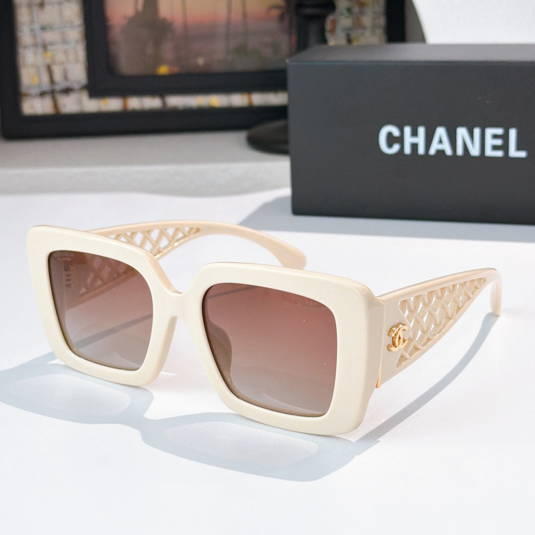 Square sunglasses with cream frame and rose-tinted lenses, lattice temple details