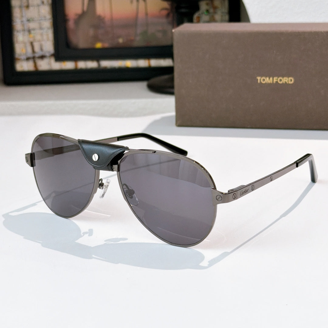 Silver-gray framed aviator sunglasses with dark lenses and black temple arms