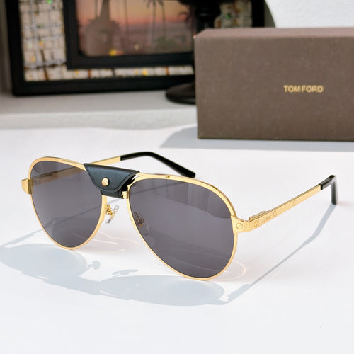 Gold-framed aviator sunglasses with dark gray lenses and black temple arms