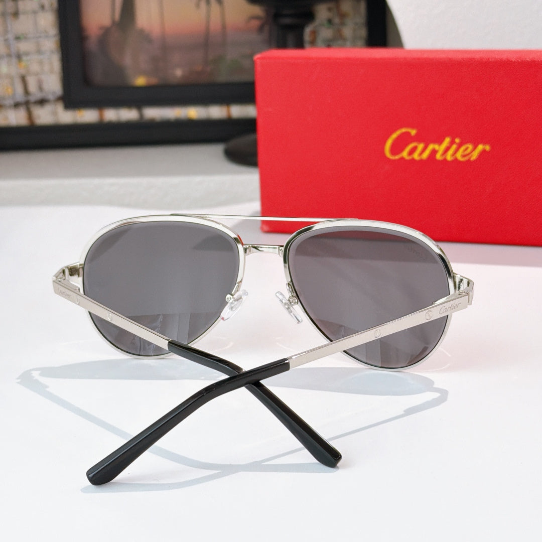 Cartier sunglasses with dark lenses and silver frame, black temple arms