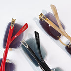 Cartier sunglasses close-up with red and green-tinted lenses, gold metal frames