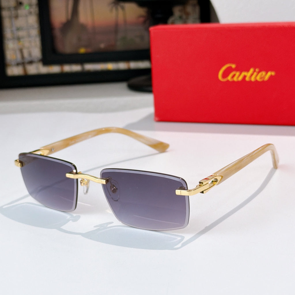 Cartier sunglasses with gold frame and dark purple-tinted lenses, gold accents