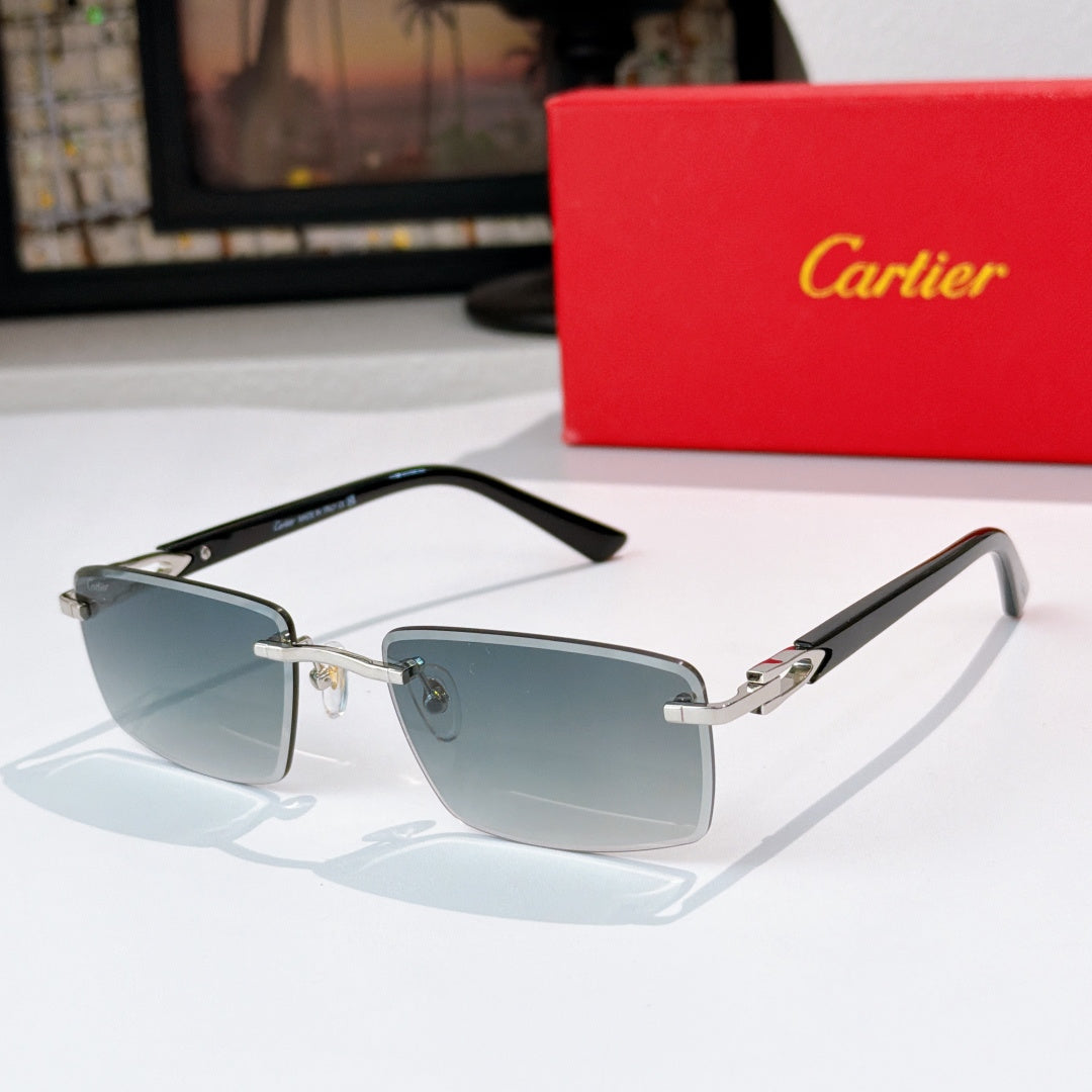 Cartier sunglasses with silver frame and light blue-tinted lenses, gold accents