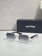 Chrome sunglasses with dark gradient lenses, black frame, and slim metal temples
