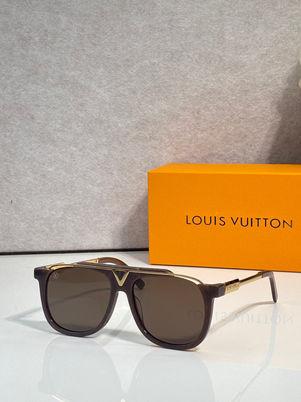 Louis Vuitton square sunglasses with brown lenses and dark tortoiseshell frame