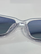 Dior glasses close-up of clear front frame and blue tinted lenses
