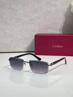 Gold sunglasses with dark gray-blue square lenses and black temple tips