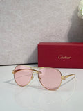 Cartier sunglasses with pink tinted lenses and gold-tone cat-eye frames, side detail