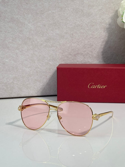 Cartier sunglasses with pink tinted lenses and gold-tone cat-eye frames, side detail