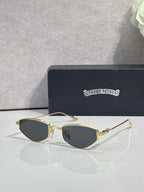 Gold-tone metal glasses with dark lenses and slender gold temples