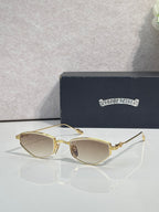 Gold-tone metal glasses with light beige lenses and narrow rims