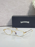 Gold-tone metal glasses with clear lenses and thin curved rims