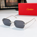 Silver cat-eye sunglasses with dark gray tinted lenses and decorative metal temples.