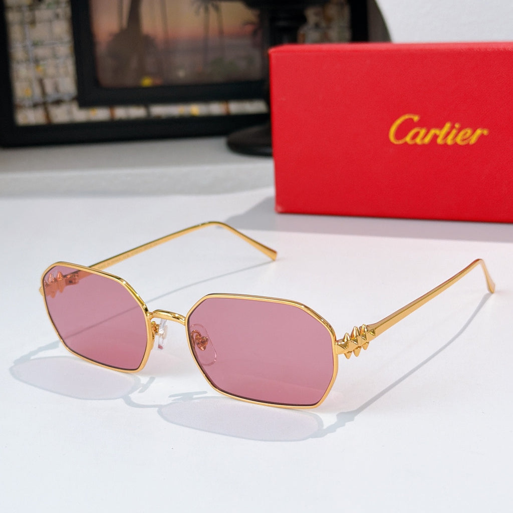 Gold-tone sunglasses with pink tinted lenses and angular frames