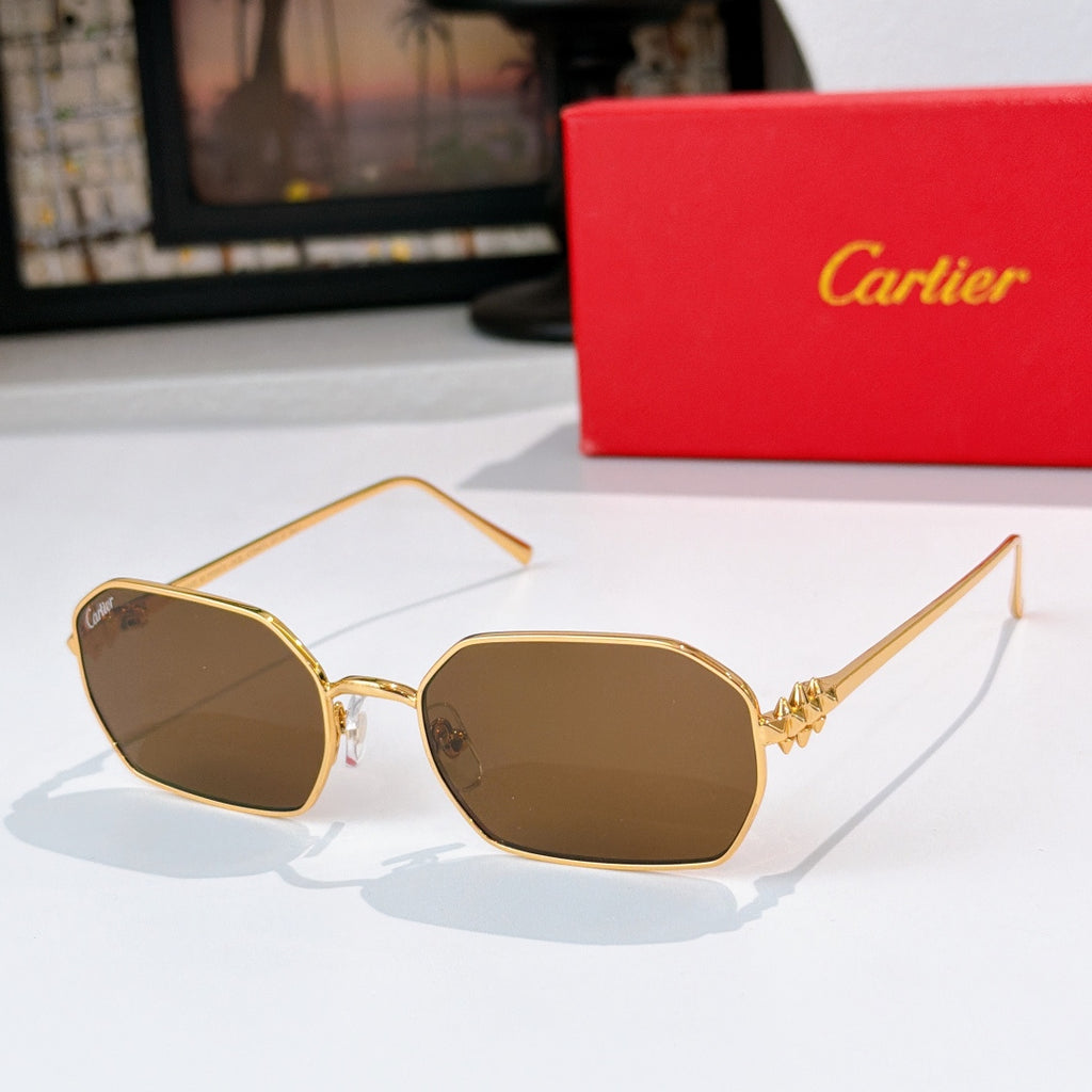 Gold-tone sunglasses with brown tinted lenses and angular frames