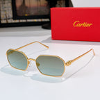 Gold-tone sunglasses with teal tinted lenses and angular frames