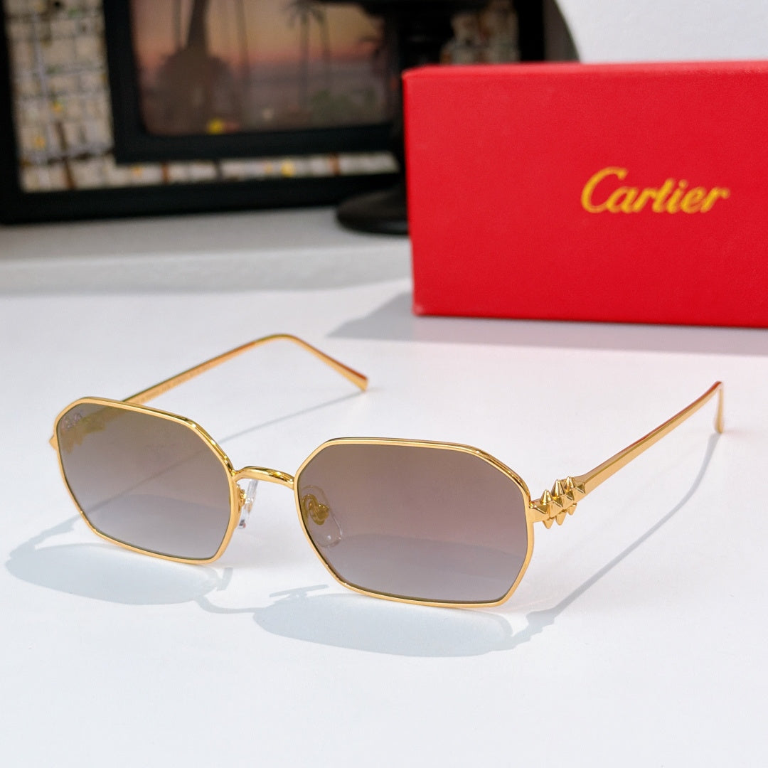 Gold-tone sunglasses with light gray tinted lenses and angular frames